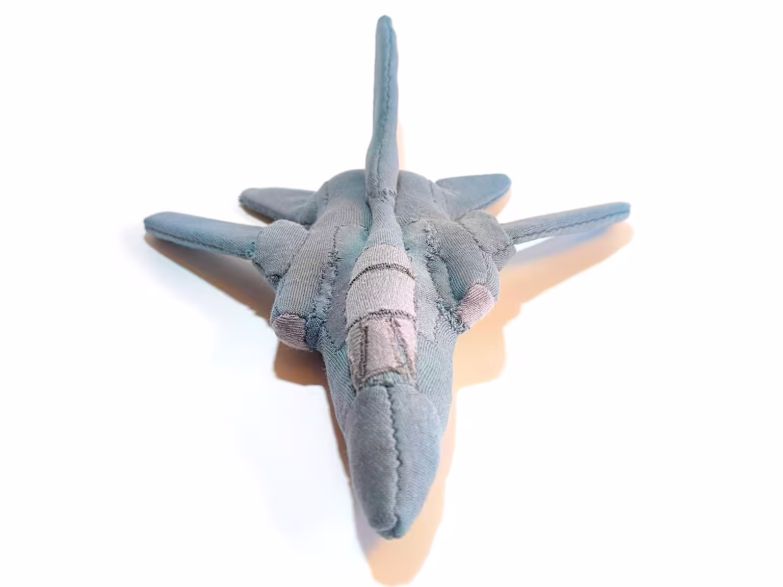 Soft toy fighter jet from the front