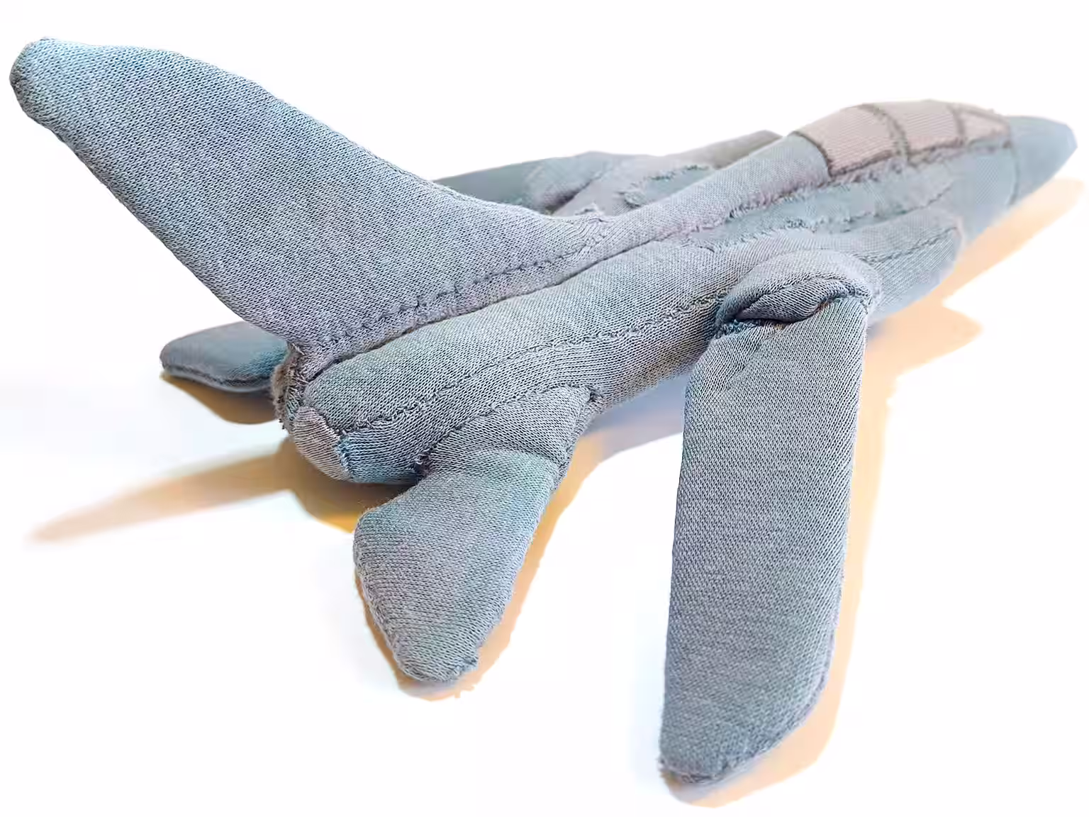 Soft toy fighter jet from the flank