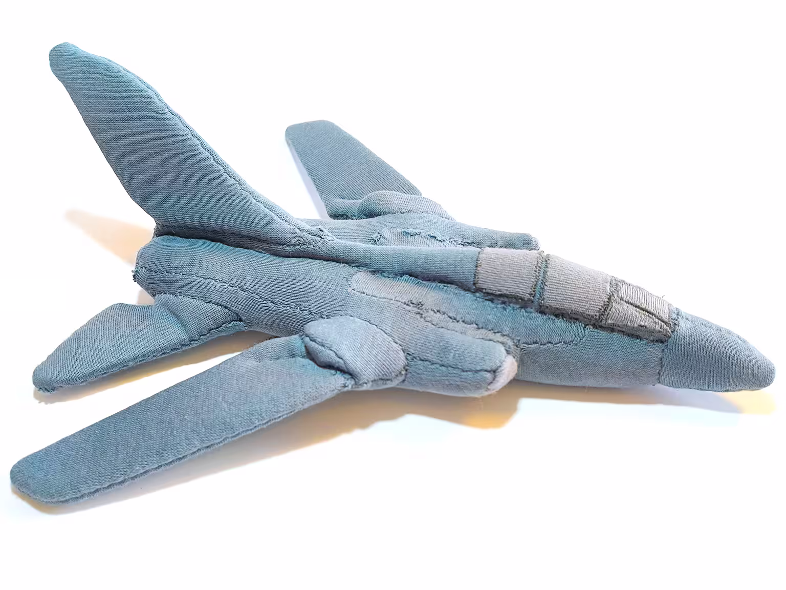 Soft toy fighter jet from the side