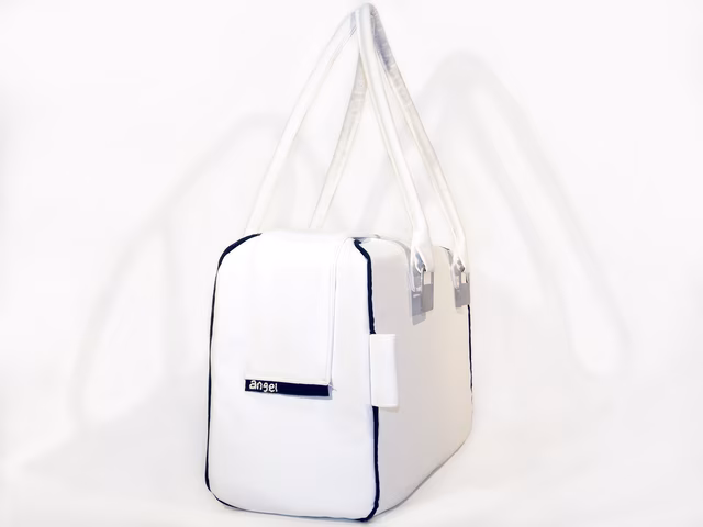 The bag, perspective, from the end showing the zipper-cover embroidered with "angel"